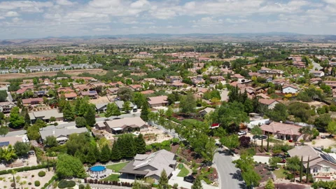 Aerial drone view of Paso Robles California suburb - homes, trees, hills 12 Stock Footage 308424832