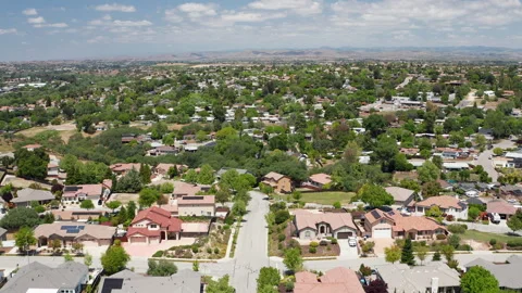 Aerial drone view of Paso Robles California suburb - homes, trees, hills 09 Stock Footage 308425254