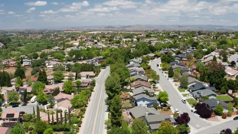 Aerial drone view of Paso Robles California suburb - homes, trees, hills 11 Stock Footage 308427645