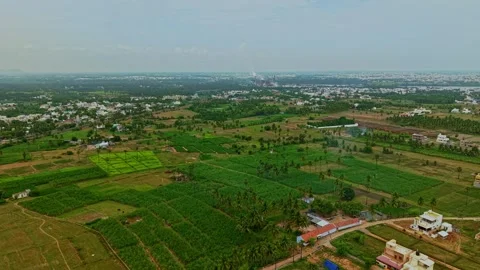 Aerial Drone View of Patchwork Farms and Rural Settlements Across Namakkal Stock Footage 348703126