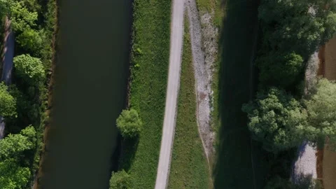 Aerial drone view of a path between the Isar river in Munich Stock Footage 132020200