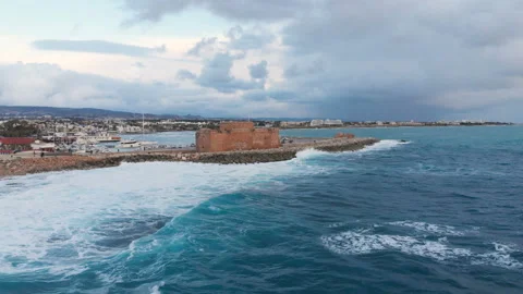 Aerial drone view of Pathos Castle on Mediterranean seashore in Cyprus island Stock Footage 134020182