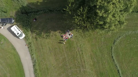 Aerial Drone View Of People Having A Picnic In A Park Stock Footage 266782501