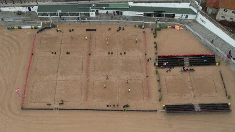 Aerial drone view of people playing beach tennis Stock Footage 219513359
