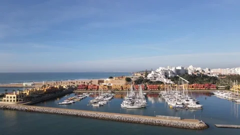 Aerial drone view of Praia da Rocha and marina in Portimao Stock Footage 167923989