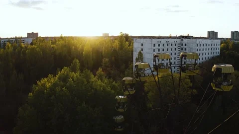 Aerial drone view of Pripyat Ferris wheel. Pripyat near the Chernobyl nuclear Stock Footage 153138942