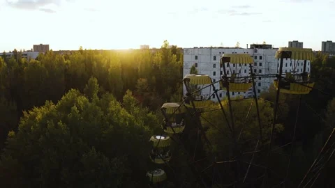 Aerial drone view of Pripyat Ferris wheel. Backward flying reveal of the Ferris Stock Footage 153139655