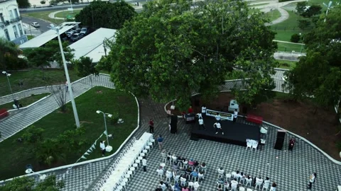 Aerial drone view of public dance performance in urban plaza in Paraguay 스톡 동영상 335173623