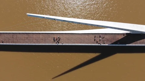 Aerial drone view of Puente de la Mujer bridge, Puerto Madero, Buenos Aires Stock Footage 100886355