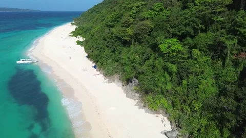 Aerial drone view of Puka Beach Boracay with turquoise water and white sand  Stock-Footage 334050035