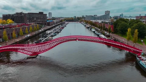 Aerial drone view Python Bridge Eastern Docklands Amsterdam Netherlands 動画素材 271171999
