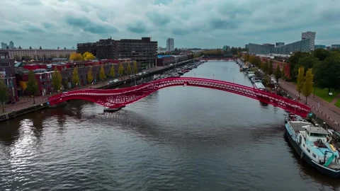 Aerial drone view Python Bridge Eastern Docklands Amsterdam Netherlands 動画素材 271172070