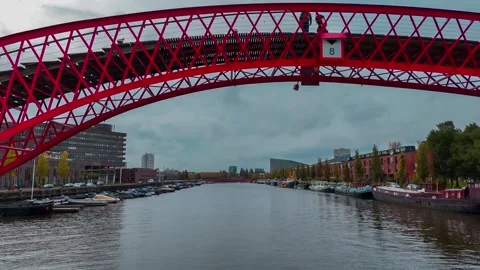 Aerial drone view Python Bridge Eastern Docklands Amsterdam Netherlands 動画素材 271172221