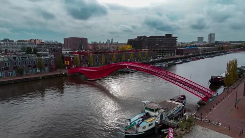 Aerial drone view Python Bridge Eastern Docklands Amsterdam Netherlands 動画素材 271172326