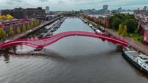 Aerial drone view Python Bridge Eastern Docklands Amsterdam Netherlands Video stock 271172580