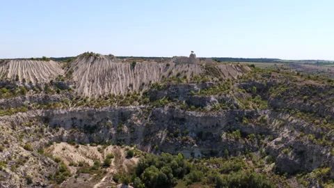 Aerial drone view of Quarry landscape revealing rock extraction and the impact Stock Footage 345500955