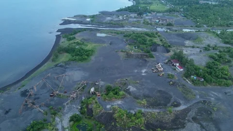Aerial drone view of quarry site with aggregate stockpiles and industrial site Stock Footage 337796082