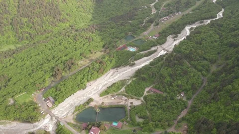 Aerial drone view of recreation centers in Digora Gorge Stock Footage 337462856