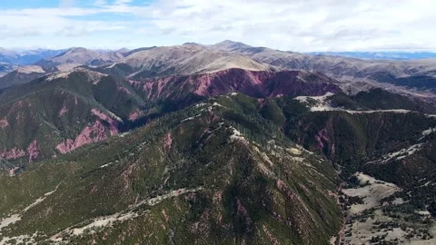 Aerial Drone View of Red Soil Mountains in Changdu Tibet 4K UHD Stock Footage 319643487