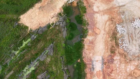 Aerial drone view of red soil after land clearing Видео 332593374