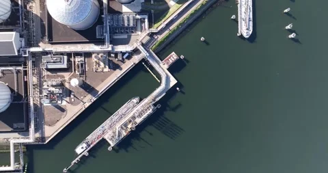 Aerial drone view of refueling infrastructure in a large industrial port. Stock Footage 249284216