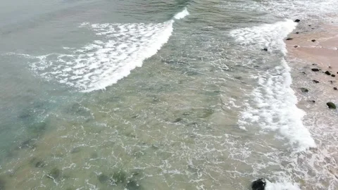 Aerial drone view of relaxing waves-  96 Stock Footage 310196435