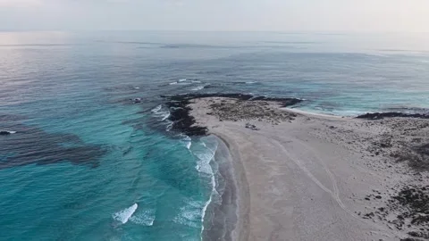Aerial drone view of remote beach and turquoise ocean Stock Footage 327921624