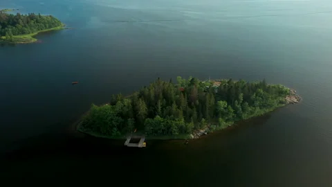 Aerial drone view of remote forested island in the archipelago of Sweden Stock Footage 158913769