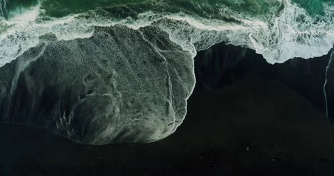 Aerial drone view of rhythmic ocean waves forming natural water patterns Stock Footage 329460596