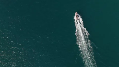 Aerial Drone View of RIB Boat Cruising Across the Ocean Stock Footage 337051406