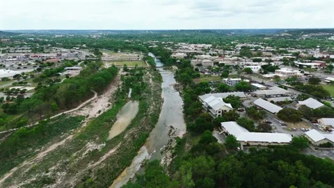 Aerial Drone View of River and Downtown Kerrville Texas Stock Footage 345144986
