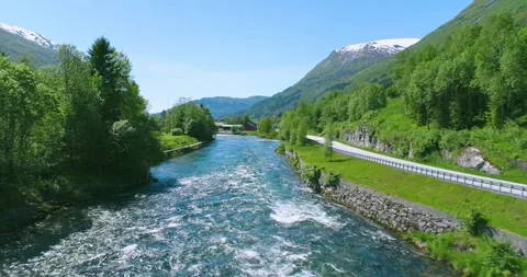 Aerial Drone View of a River Next to a Road in Norway (Stryn) Stock Footage 247378164
