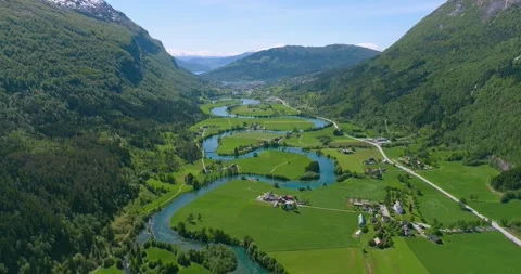 Aerial Drone View of a River Snaking through a town in Norway (Stryn) Stock Footage 247378205