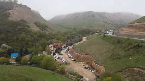 Aerial drone view of the road leading to Medovye Waterfalls Stock Footage 337534813