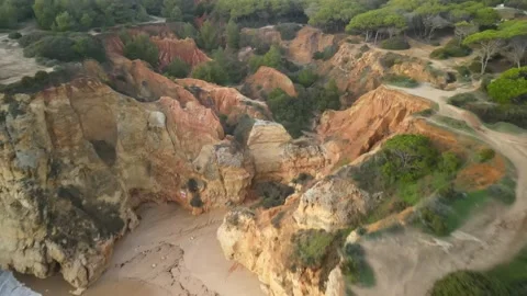 Aerial drone view of Rocha do Leao, Praia do Vau and Ponta Joao de Arens Stock Footage 167923724