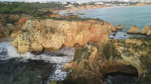 Aerial drone view of Rocha do Leao, Praia do Vau and Ponta Joao de Arens Stock Footage 167923909
