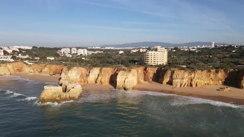 Aerial drone view of Rocha do Leao, Praia do Vau and Ponta Joao de Arens Stock Footage 167924133