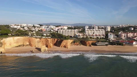 Aerial drone view of Rocha do Leao, Praia do Vau and Ponta Joao de Arens Stock Footage 167924311