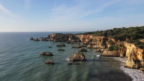 Aerial drone view of Rocha do Leao, Praia do Vau and Ponta Joao de Arens Stock Footage 167924415