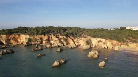 Aerial drone view of Rocha do Leao, Praia do Vau and Ponta Joao de Arens Stock Footage 167924425