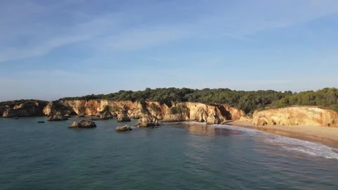 Aerial drone view of Rocha do Leao, Praia do Vau and Ponta Joao de Arens Stock Footage 167924518