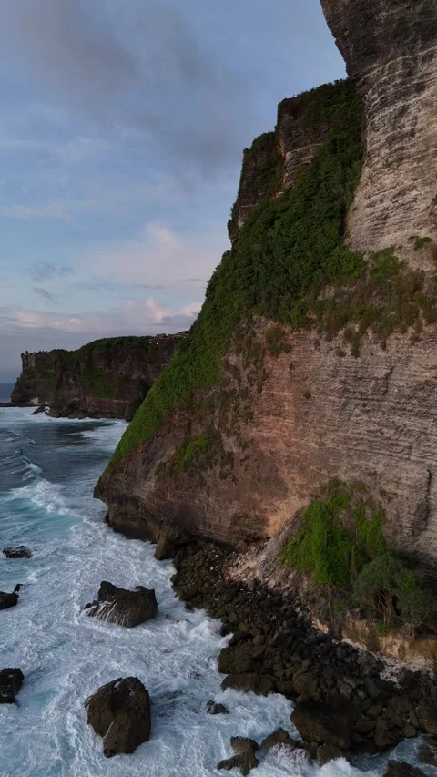 Aerial Drone View of Rocky Cliff Coastline in Uluwatu, Bali, Indonesia Stock Footage 328719325