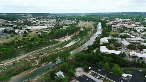 Aerial Drone View of Rocky River Banks and Kerrville Texas Stock Footage 345145504