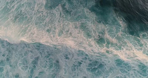 Aerial drone view rolling big powerful waves. 4k shot blue turquoise ocean Stock Footage 136426163