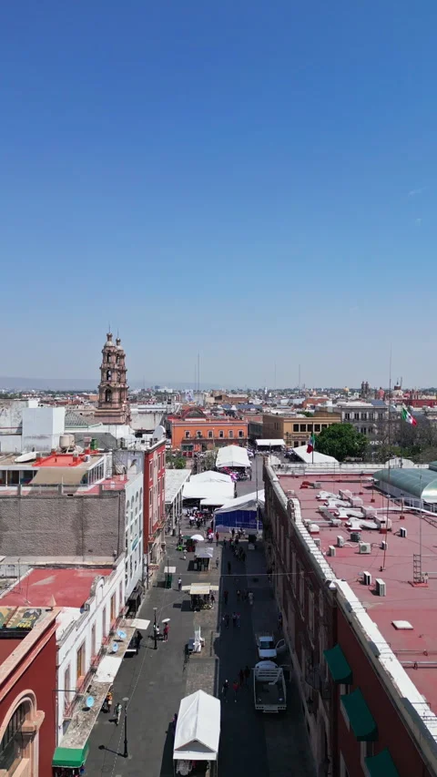 Aerial drone view of the rooftops and church towers of the historic center in Stock Footage 342062349
