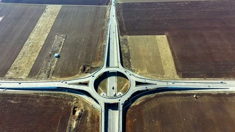 Aerial drone view of a Roundabout with traffic in Ploiesti, Romania Stock Footage 129946953