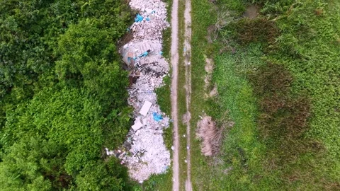Aerial drone view of rubbish dump in natural outdoor area 스톡 동영상 337727334