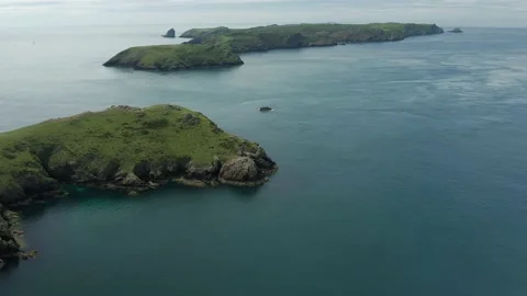 Aerial drone view of the rugged cliffs of Skomer Island in the Irish Sea Stock Footage 136749657