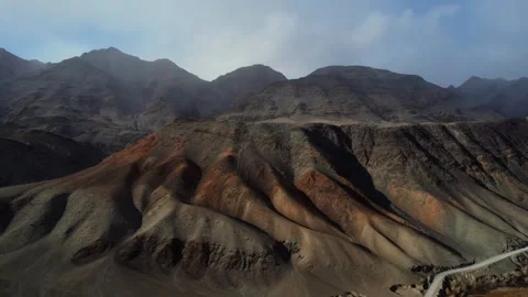 Aerial Drone View of Rugged Mountains and Winding Road in Mongolia Stock Footage 335134376