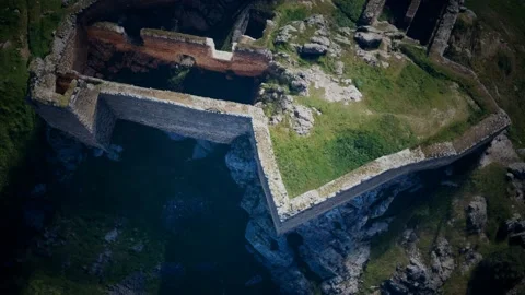 Aerial drone view of the ruins of ancient castle Stockbeeldmateriaal 133836085